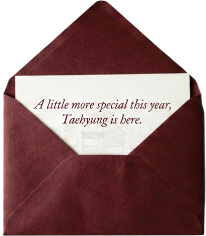 Open burgundy envelope with a letter reading 'A little more special this year, Taehyung is here.'
